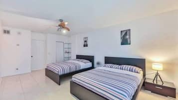 1 bedroom, desk, iron/ironing board, travel cot