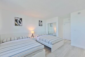 1 bedroom, desk, iron/ironing board, travel crib