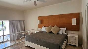 Luxury Condo, Partial Sea View | In-room safe, blackout curtains, iron/ironing board, free WiFi