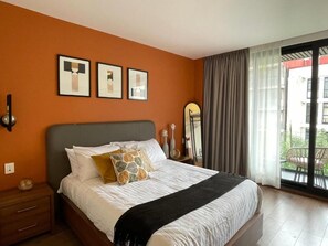Deluxe Suite, City View | In-room safe, desk, iron/ironing board, free WiFi