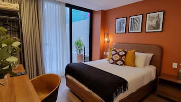 Executive Suite, Balcony, Courtyard View | In-room safe, desk, iron/ironing board, free WiFi