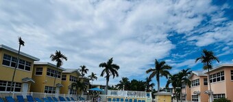 Private beach access w/ water and dolphin views, w/heated pool and fishing pier