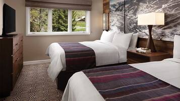 1 bedroom, desk, iron/ironing board, travel crib