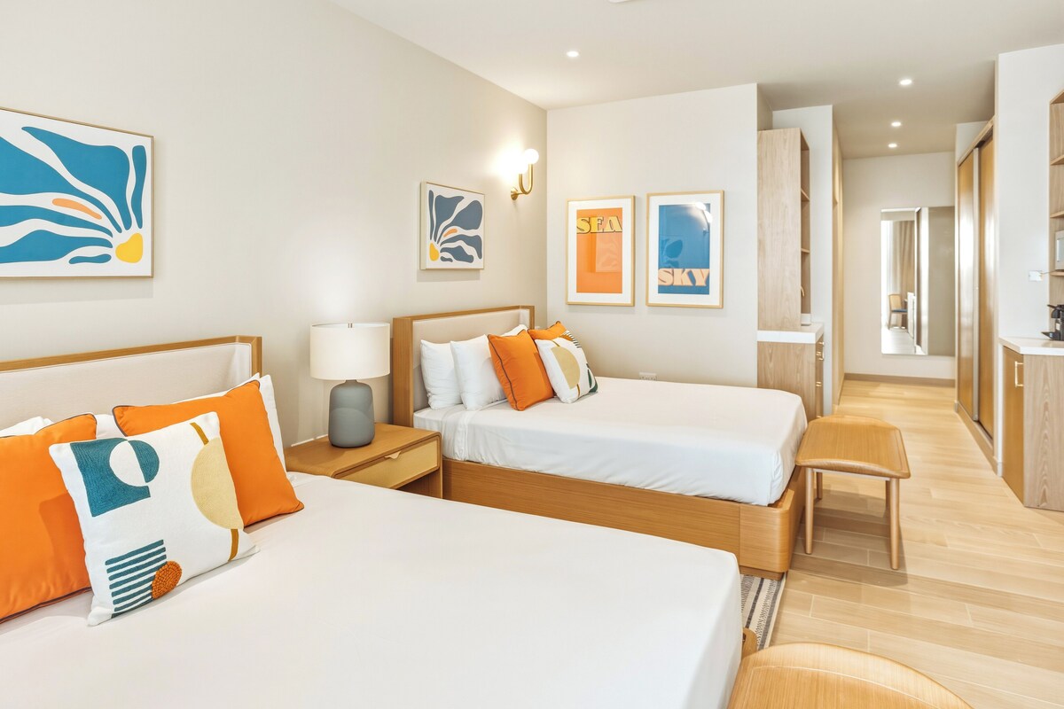 Premium bedding, pillow-top beds, in-room safe, laptop workspace