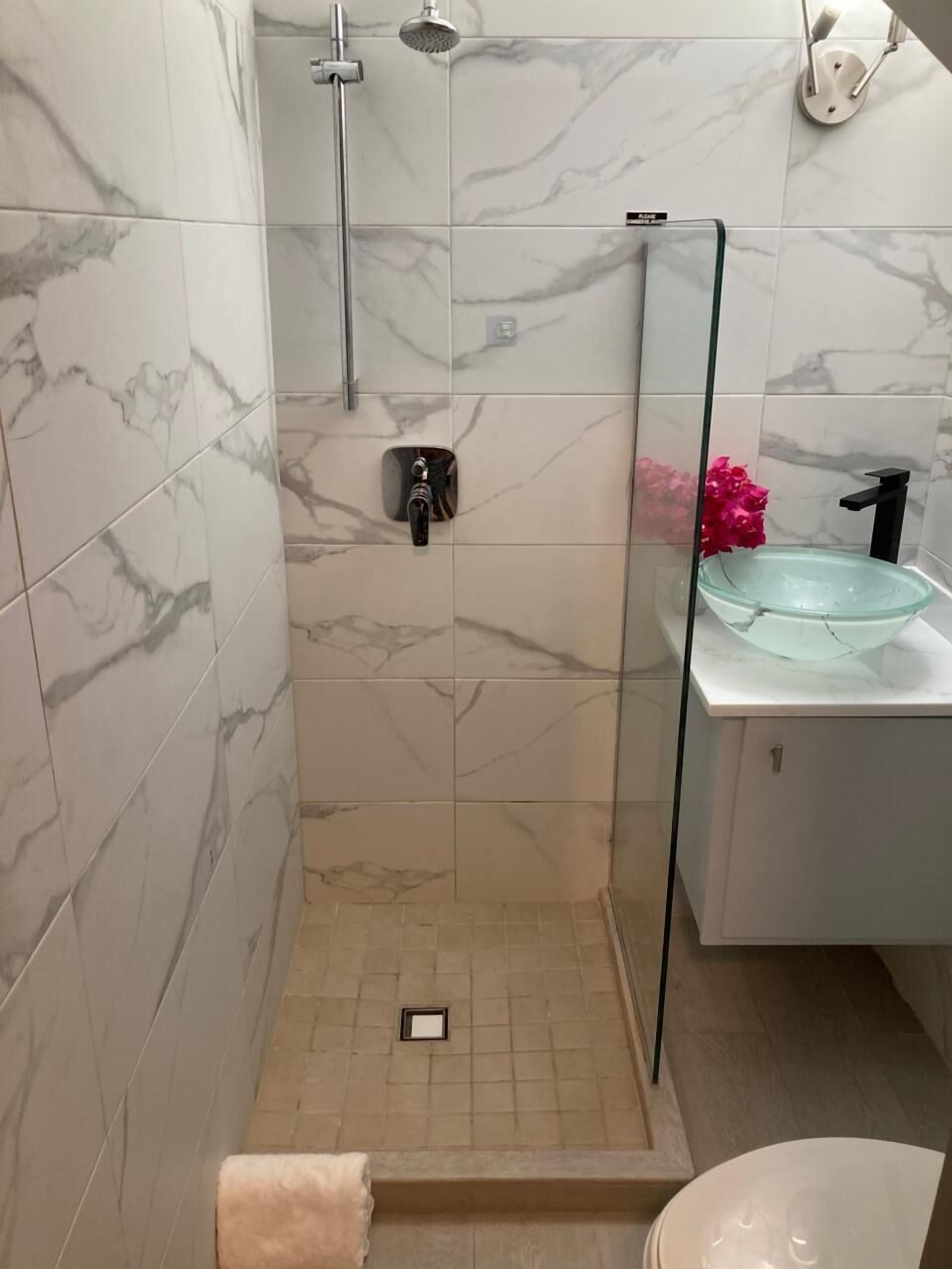 Hair dryer, towels, soap, toilet paper