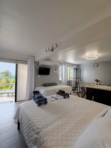 Family Studio near Dickinson Bay & w/on-site car rental.