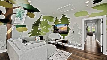 Una Smart TV, una chimenea, videojuegos