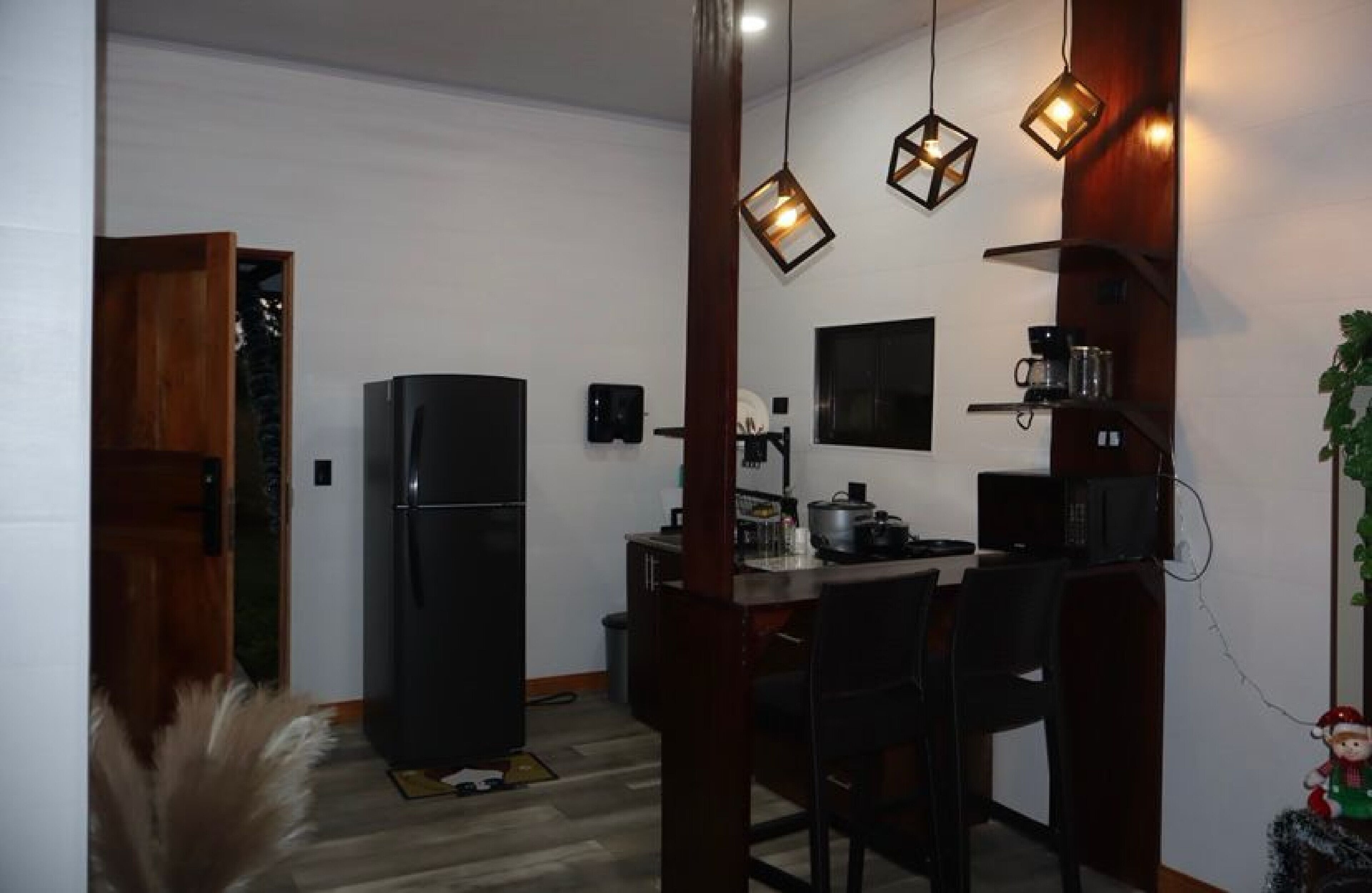 Fridge, microwave, coffee/tea maker, cookware/dishes/utensils