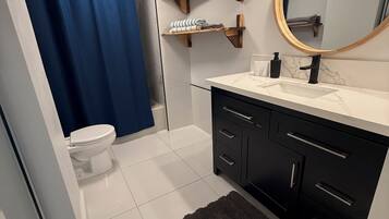 Hair dryer, towels, soap, toilet paper