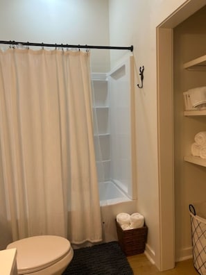 Hair dryer, towels, soap, toilet paper