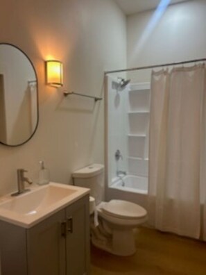 Hair dryer, towels, soap, toilet paper