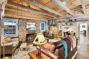 Smart TV, fireplace, foosball, books