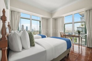 Departamento, 3 habitaciones, vista a la ciudad | Tabla de planchar con plancha, wifi gratis y ropa de cama