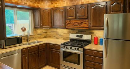 Modern 2-bedroom home with a cozy living room and fully equipped kitchen