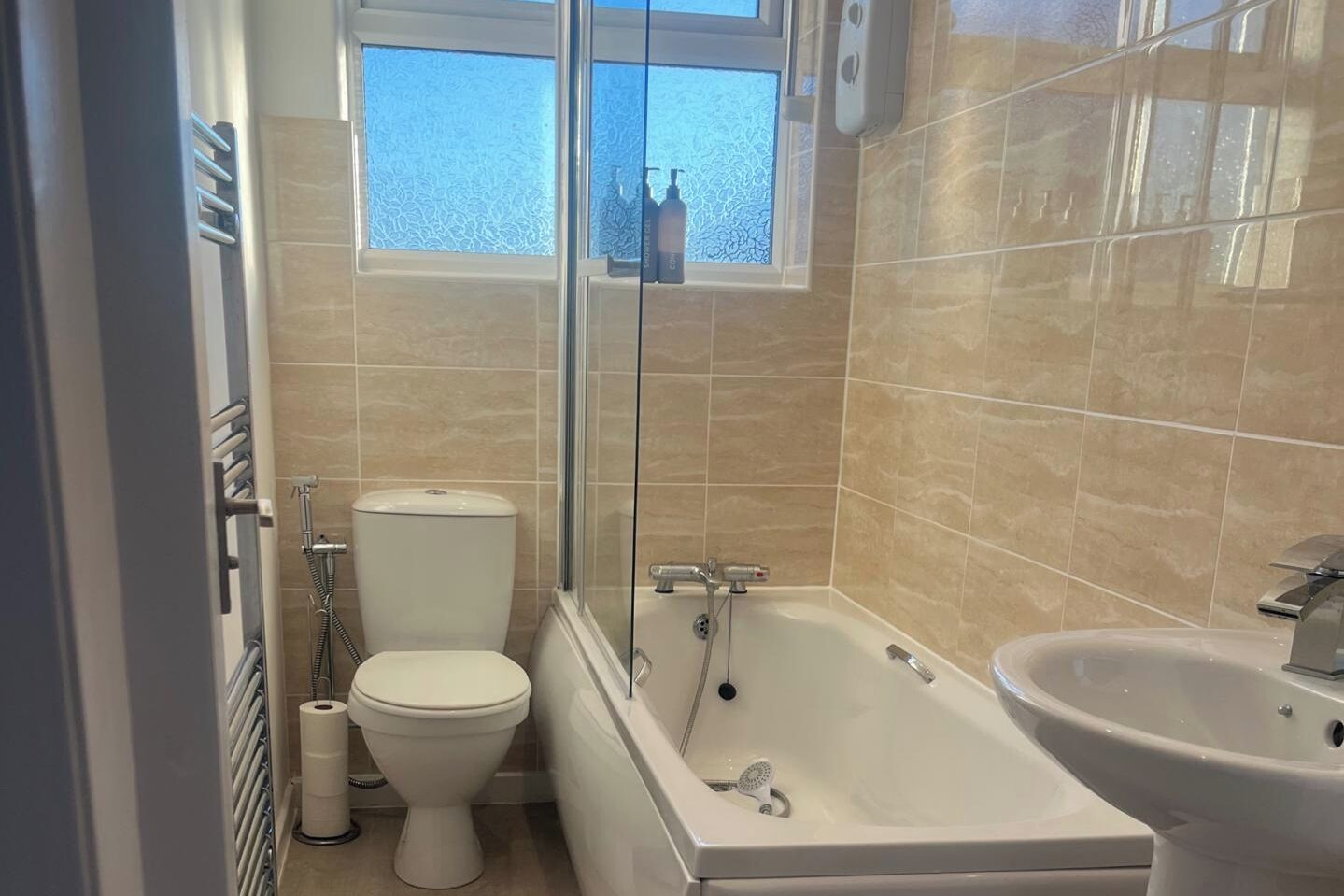 Shower, hair dryer, towels