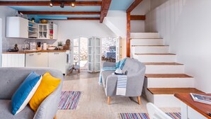 A modern interior with a kitchen, dining area, and a staircase. - La Rocca Duo - Hidden In Istria, Labin, Croatia (Labin)