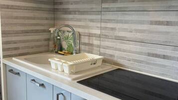 Fridge, microwave, stovetop, coffee/tea maker