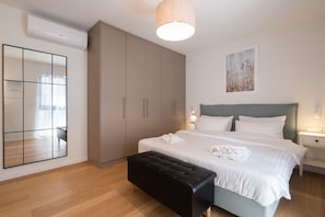 1 chambre, coffres-forts dans les chambres, fer et planche à repasser