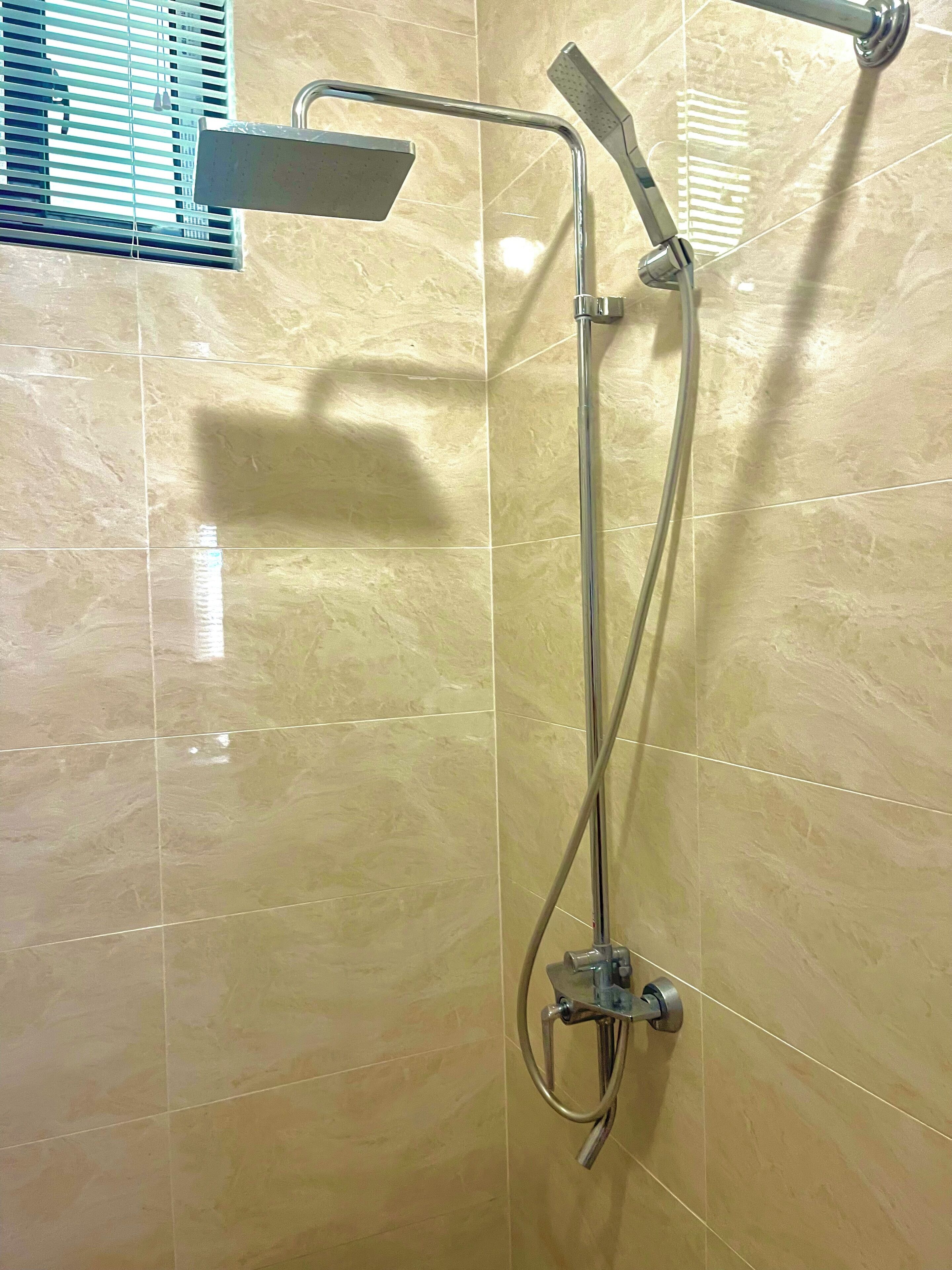 Shower, towels, soap, toilet paper