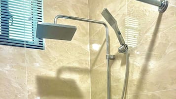 Shower, towels, soap, toilet paper