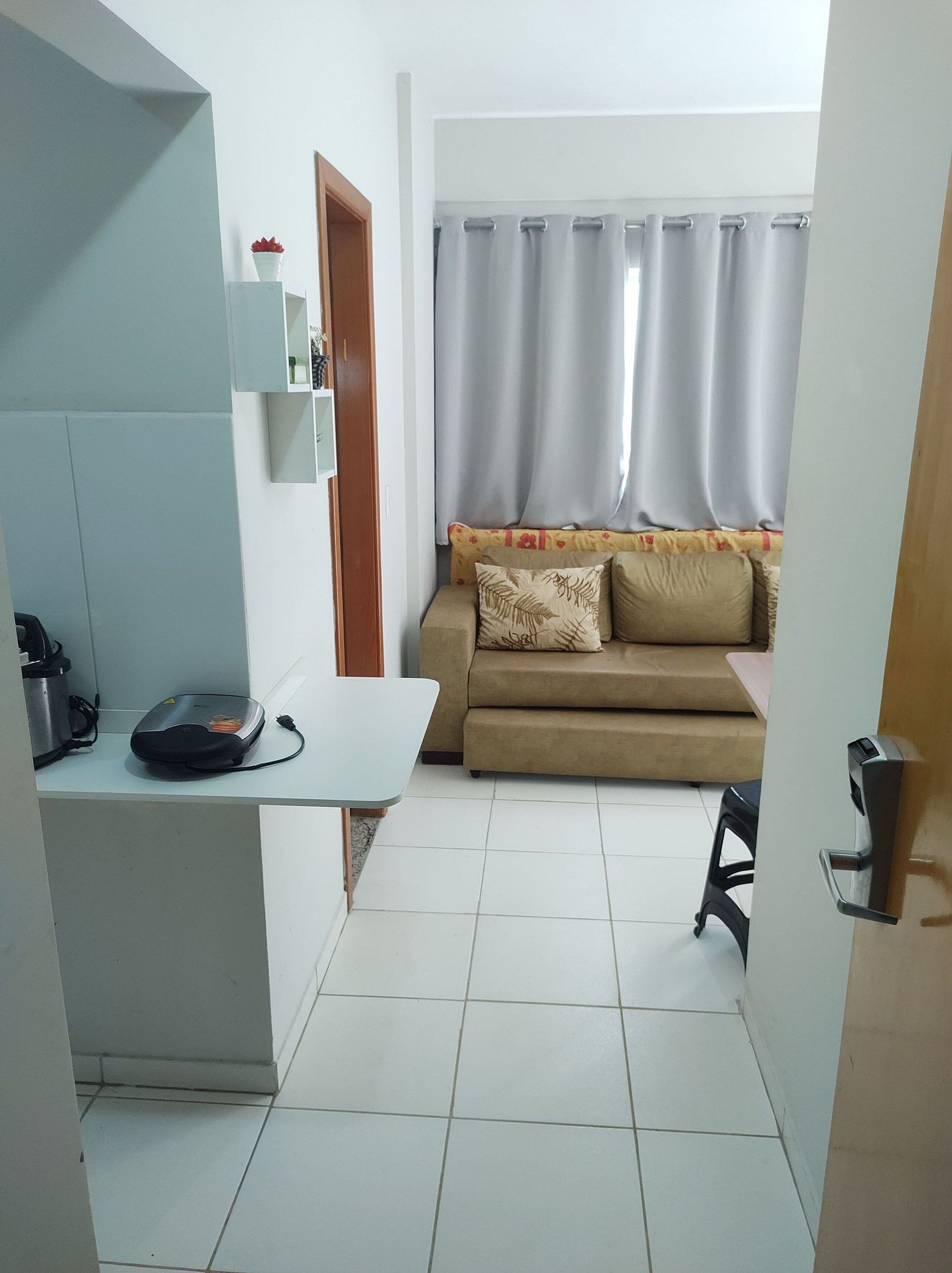 Basic Quadruple Room | Living area | 32-inch flat-screen TV with digital channels, TV