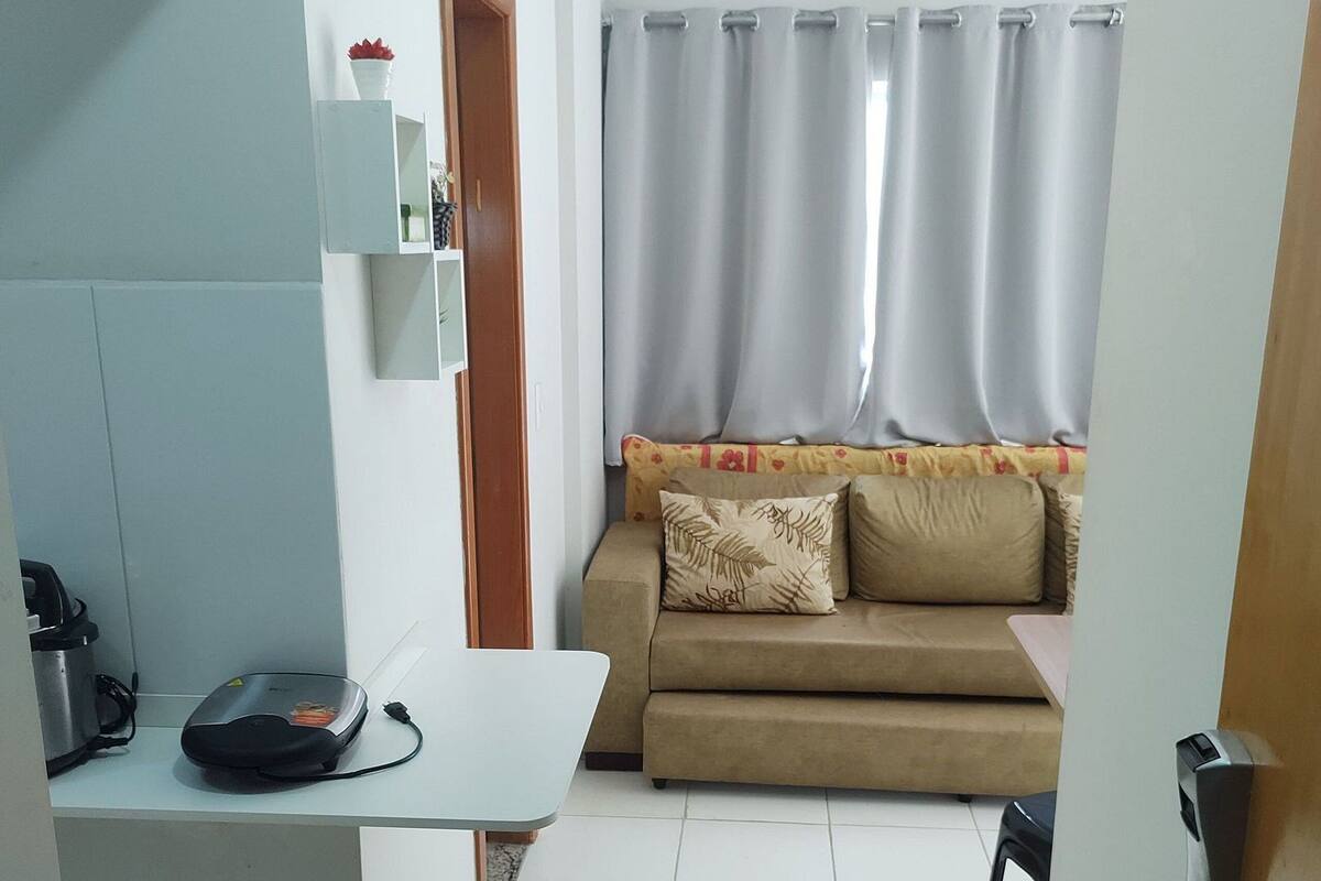 Basic Quadruple Room | Living area | 32-inch flat-screen TV with digital channels, TV