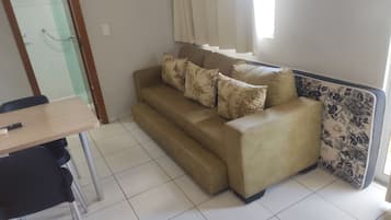 Basic Apartment | Living area | 32-inch flat-screen TV with digital channels, TV