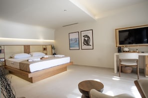 Habitació doble Deluxe, vistes al mar | Caixa forta a l'habitació i escriptori