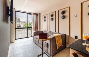 Apartamento família, 2 quartos | Área de estar