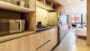 Superior appartement | Privékitchenette | Een espressoapparaat