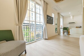 Junior Apartment, City View | Premium bedding, memory foam beds, minibar, in-room safe