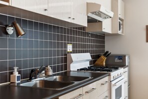 Apartment, Mountain View | Private kitchen | Toaster, highchair, freezer