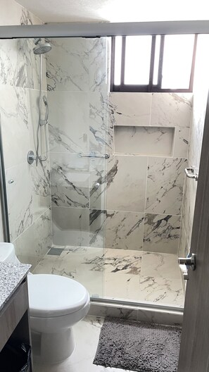 Hair dryer, towels, soap, toilet paper