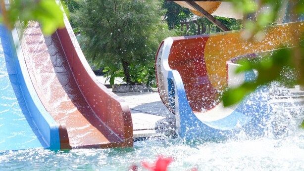A water slide with a pool at the bottom. - Seaside Sayang Heulang by Sinergi (Pameungpeuk)