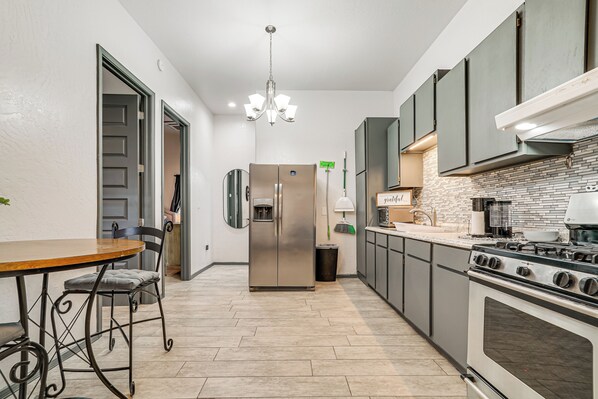Fridge, microwave, stovetop, coffee/tea maker