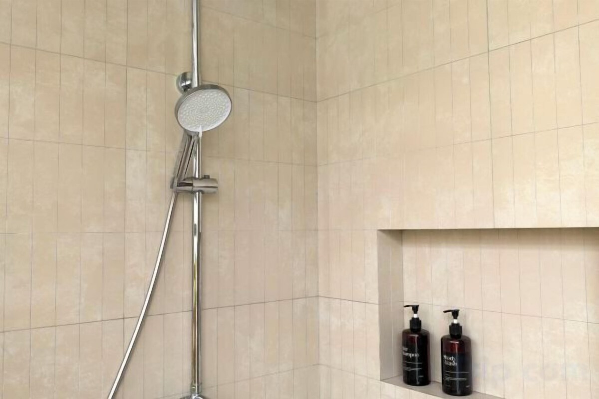 Bathroom | Hair dryer, slippers, towels, soap