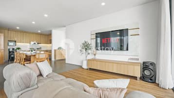 Villa, 4 Bedrooms, Garden View | Living area | 65-inch Smart TV with cable channels, Netflix, streaming services