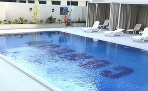 Outdoor pool - Condor Concept 7 - JVC Holiday Homes (Dubai)