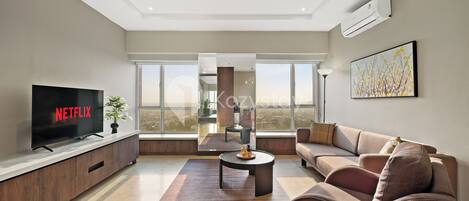 Apartment, 2 Bedrooms, City View | Living area | Flat-screen TV