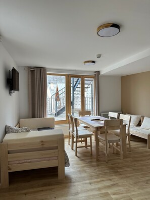 Apartment, Balcony, Mountain View | Living area | TV