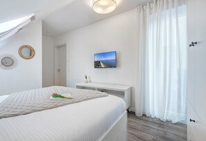 2 bedrooms, travel cot, free WiFi, bed sheets - Modern vacation accommodation Bernsteinquartier 11/90 in Loddin on the Baltic Sea (Kölpinsee)