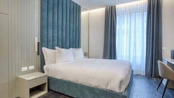 Deluxe Double Room, 1 Double Bed | Minibar, in-room safe, desk, laptop workspace