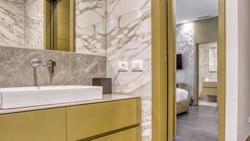 Shower, free toiletries, hair dryer, slippers
