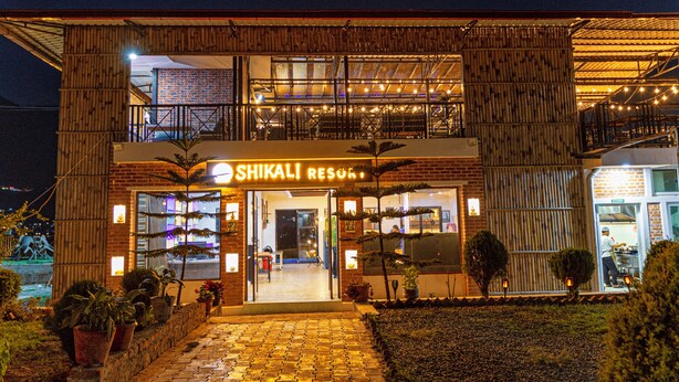A two-story building with a sign reading "SHIKALI RESORT". - Shikali Resort (Khokana)