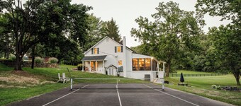 2.5 hours from Washington D.C. this spacious 5BR 2.5BA farmhouse is on a secluded 75-acre property near Manchester, MD, in scenic Carroll County. It promises a relaxing retreat near the state line, exciting local attractions, and natural landmarks.