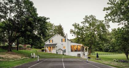 2.5 hours from Washington D.C. this spacious 5BR 2.5BA farmhouse is on a secluded 75-acre property near Manchester, MD, in scenic Carroll County. It promises a relaxing retreat near the state line, exciting local attractions, and natural landmarks.