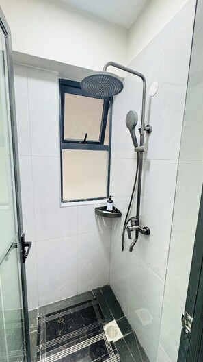 Shower, bidet, towels, soap