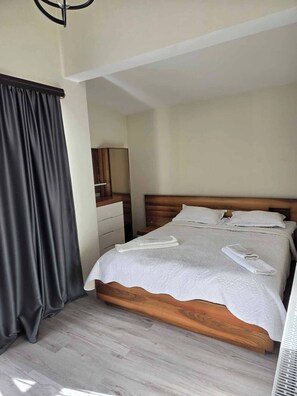 2 habitaciones, tabla de planchar con plancha y wifi gratis