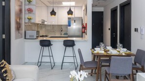 Dining - 2-bedroom ensuites,  apartment in charming Dubai with fitness room, AC, WiFi (Dubai south)