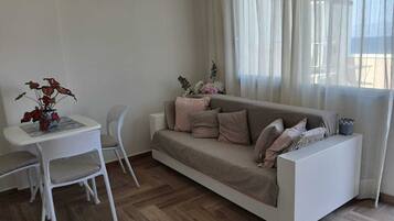 Suite monolocale Exclusive, vista mare | Area soggiorno